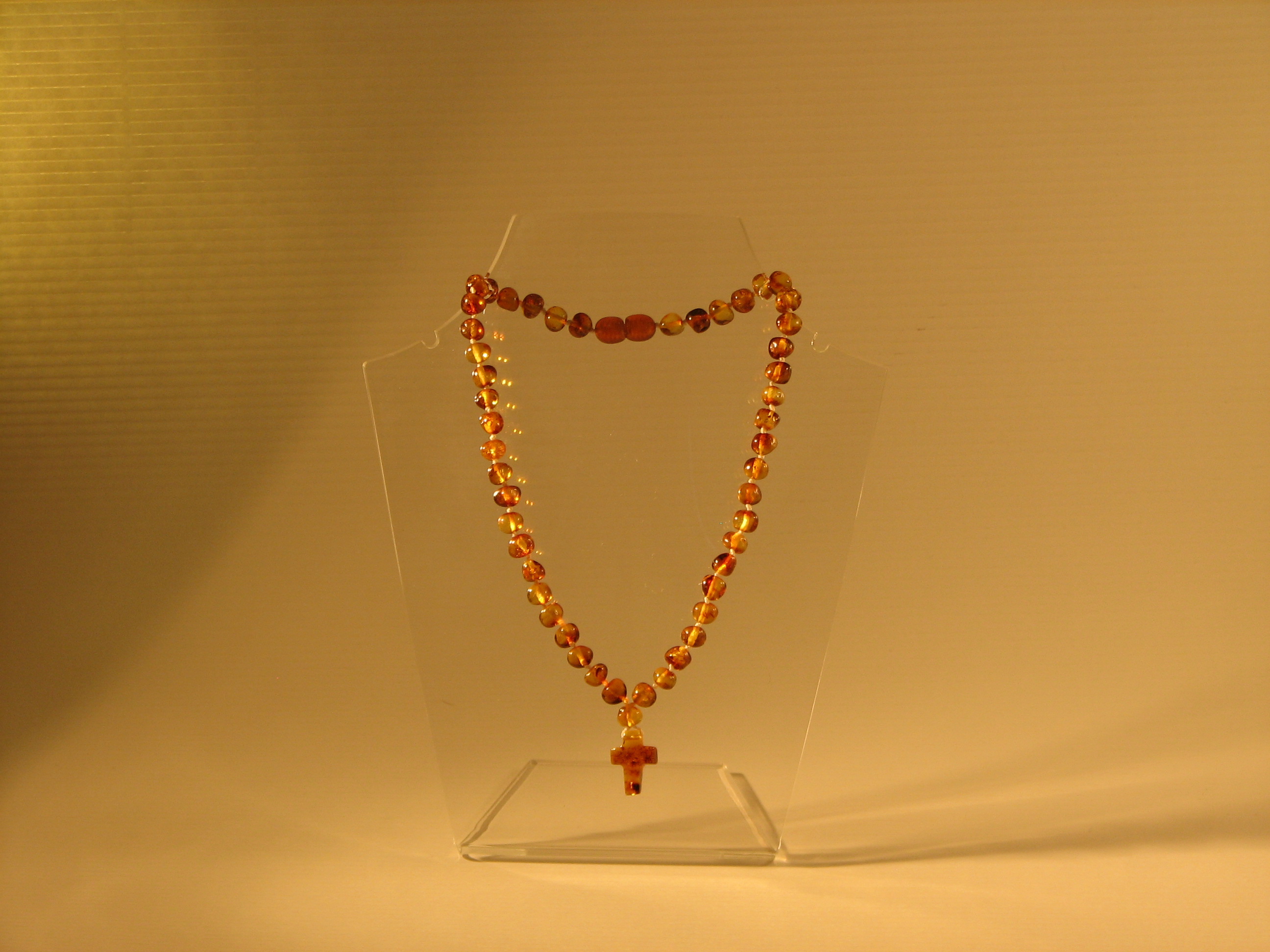Amber Teething Necklaces Baroque with Cross Cognac Amber Teething Necklaces Baroque with Cross Cognac